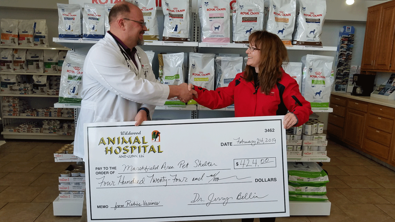 Wildwood Animal Hospital Presents Check to Marshfield Area Pet Shelter