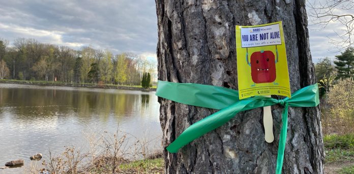 Mental-Health-Month-Green-Ribbons green ribbon around a tree at Wildwood Park