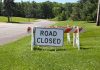 Marshfield Woman in Critical Condition, Owen Man Dead After Apparent Domestic Shooting road closed sign