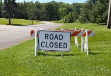 Marshfield Woman in Critical Condition, Owen Man Dead After Apparent Domestic Shooting road closed sign
